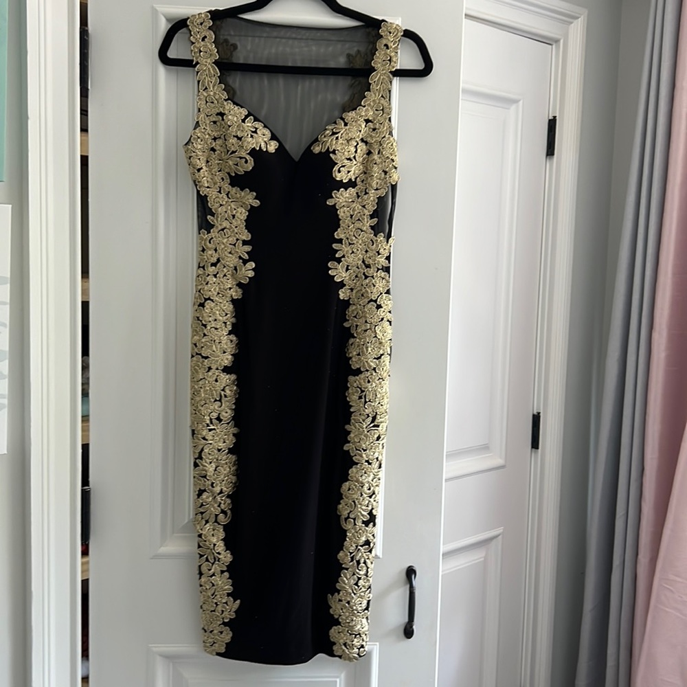 Black and gold formal midi dress. New never worn size 2.